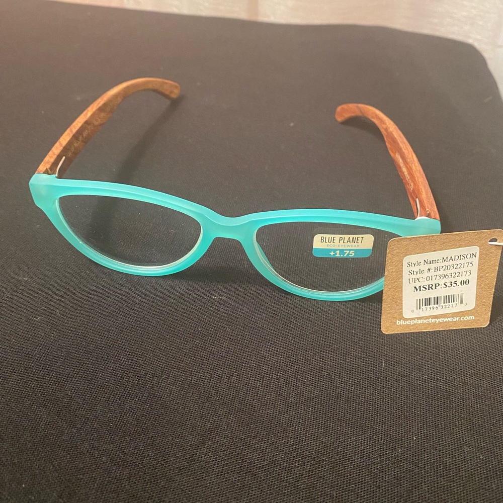 Blue Planet readers teal frosted light weight plastic frames with wood temples.